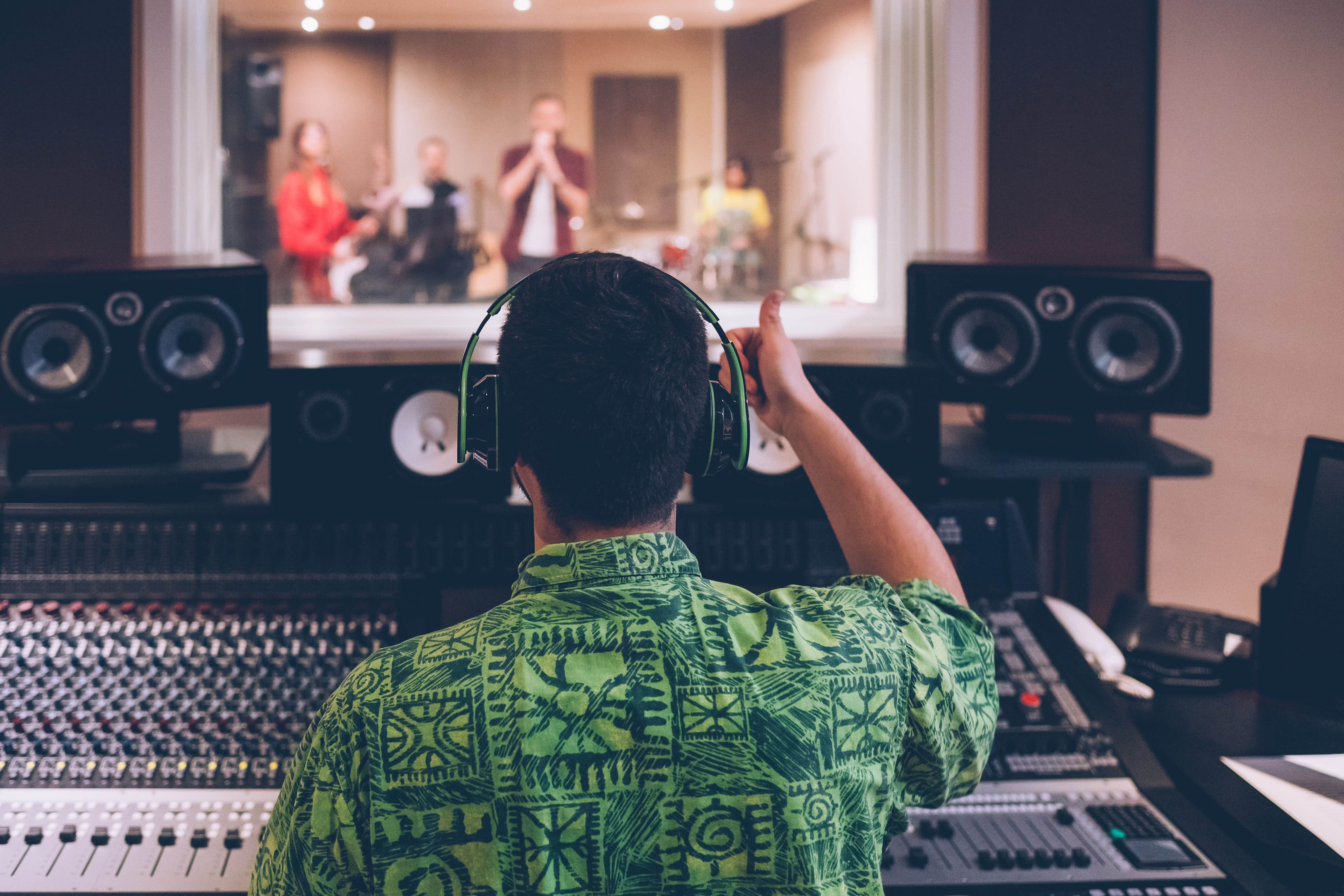 Music producer creating original music for video content