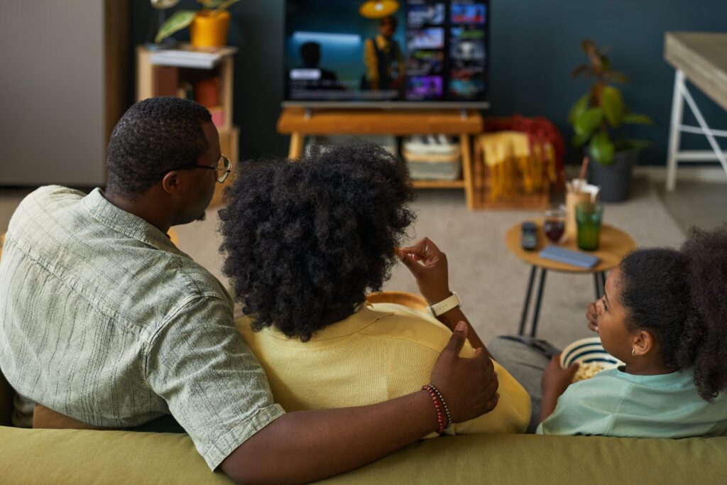 Family engaging with digital content that turns audience attention into engagement and adoption