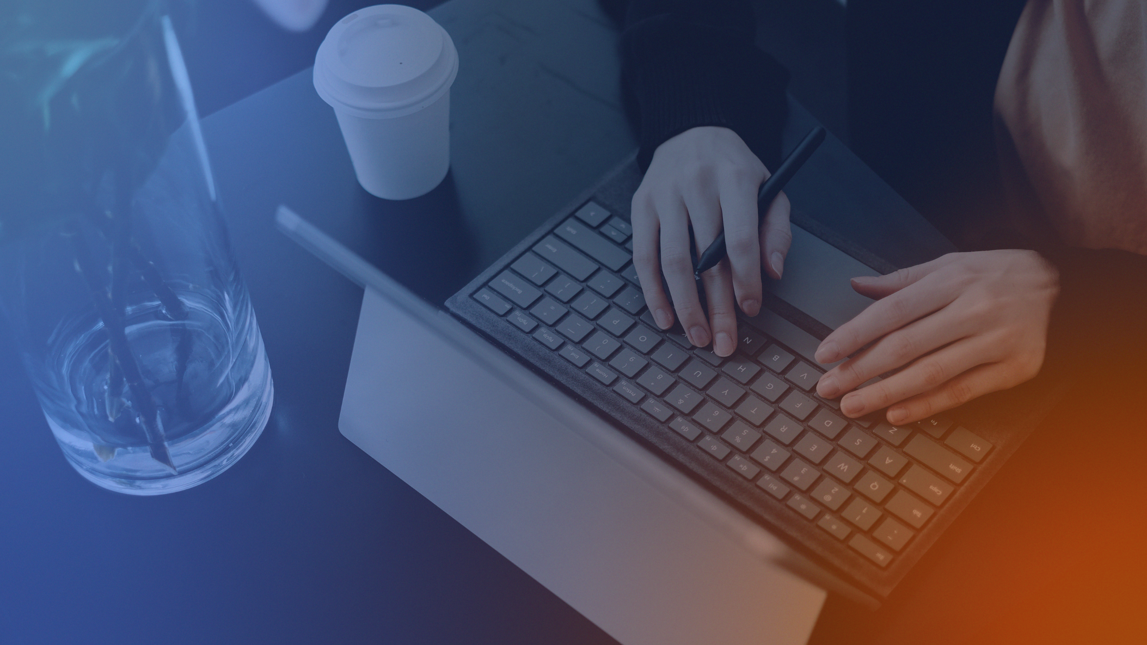 Professional using a laptop navigating a complex B2B website that lacks clear messaging and affects conversion