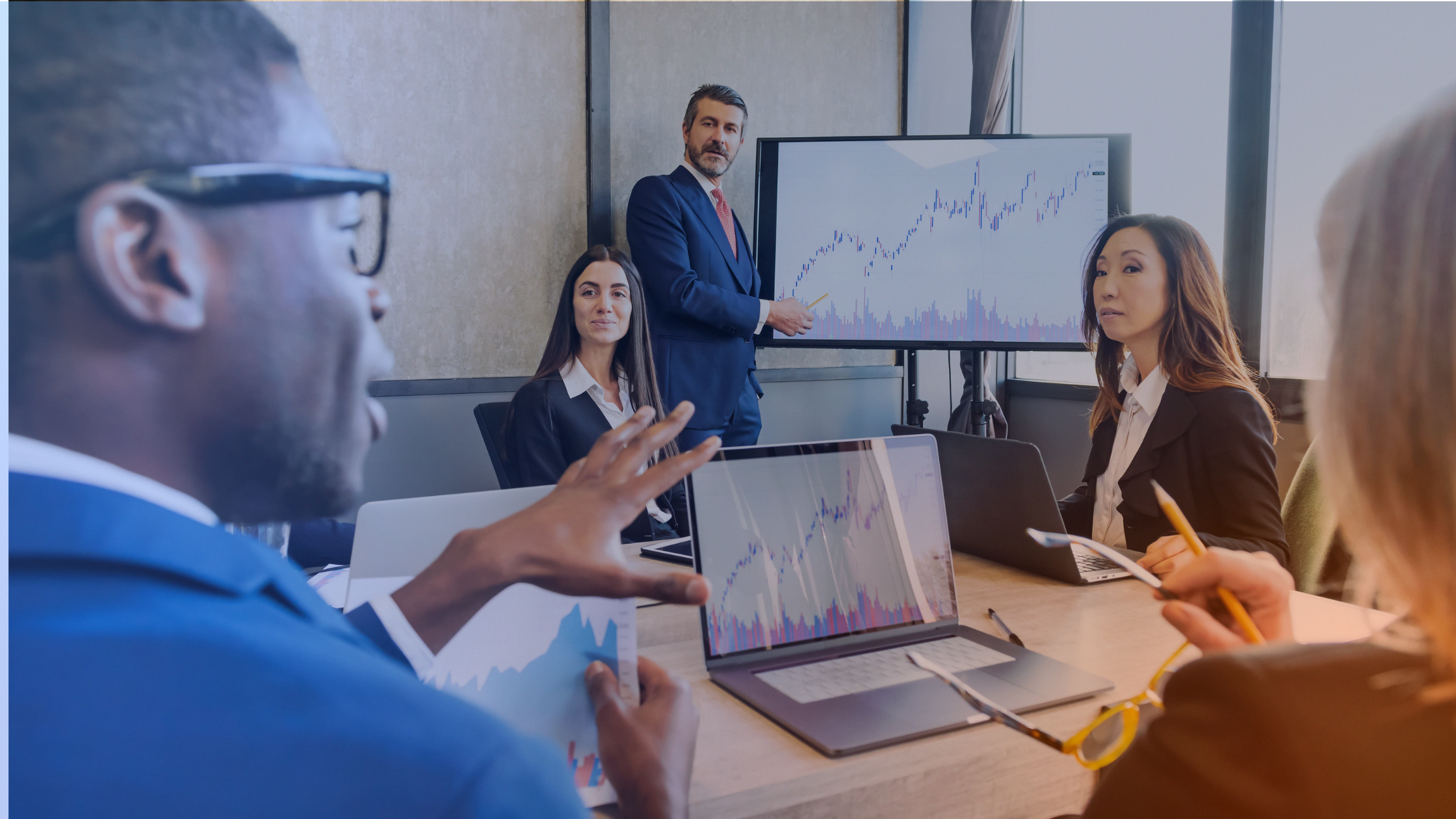 Fintech team explaining complex financial data and messaging to stakeholders