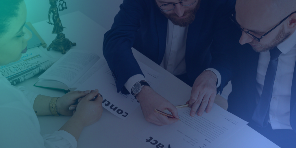 Business professionals reviewing strategic documents and buyer journey planning materials during a collaborative B2B content strategy meeting focused on improving communication and accelerating sales cycles.